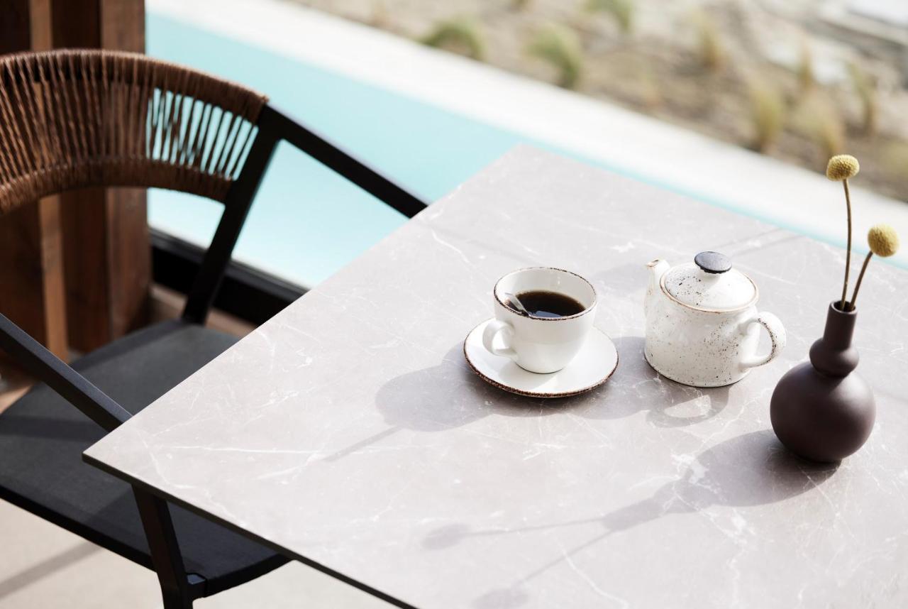 Helea Lifestyle Beach Resort Kallithéa Exterior foto A table with a porcelain tabletop